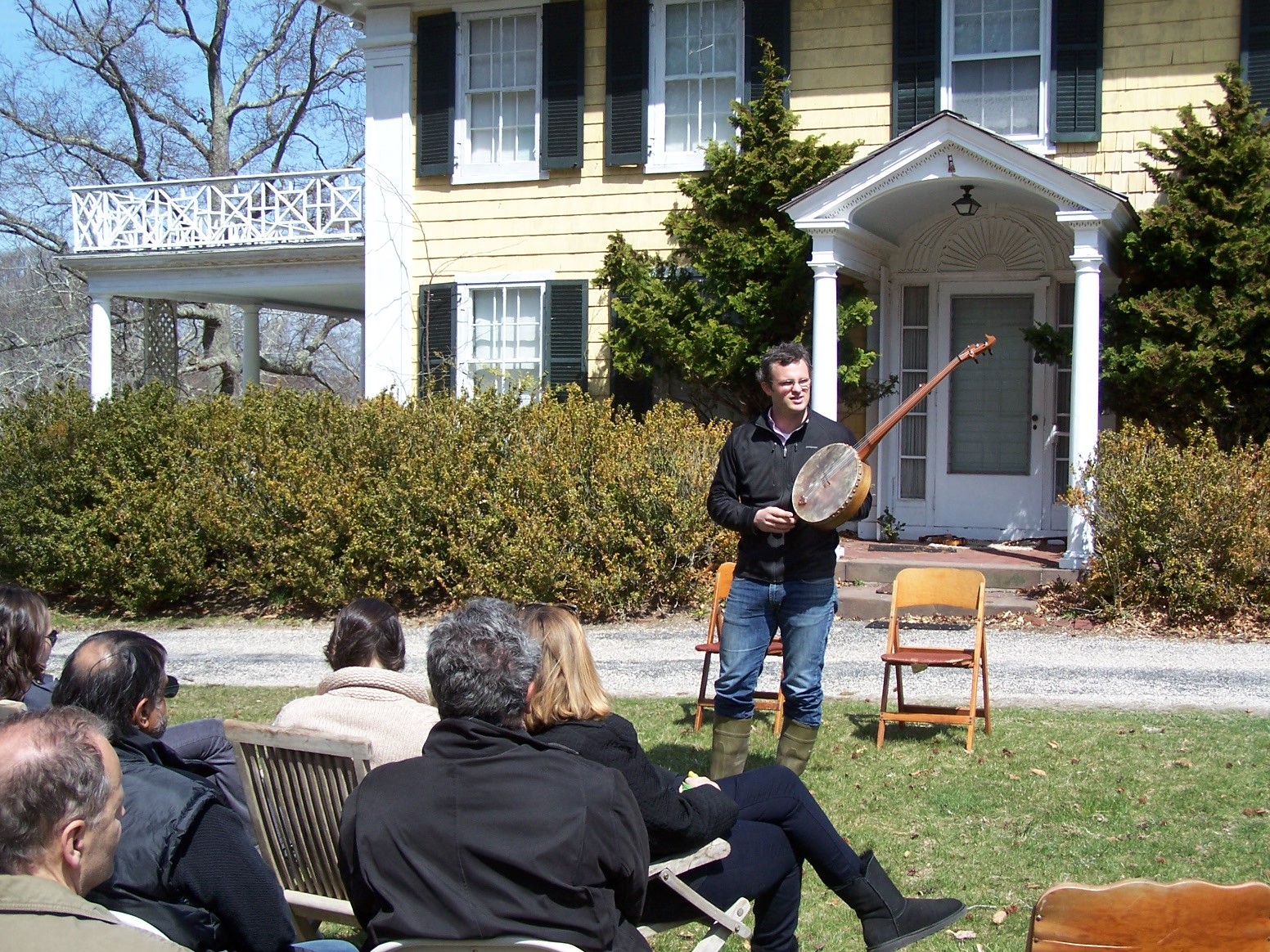 people in front of the manor