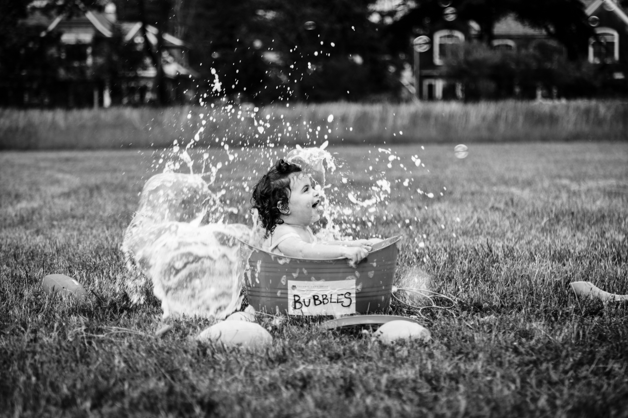 Child playing in the bubbles