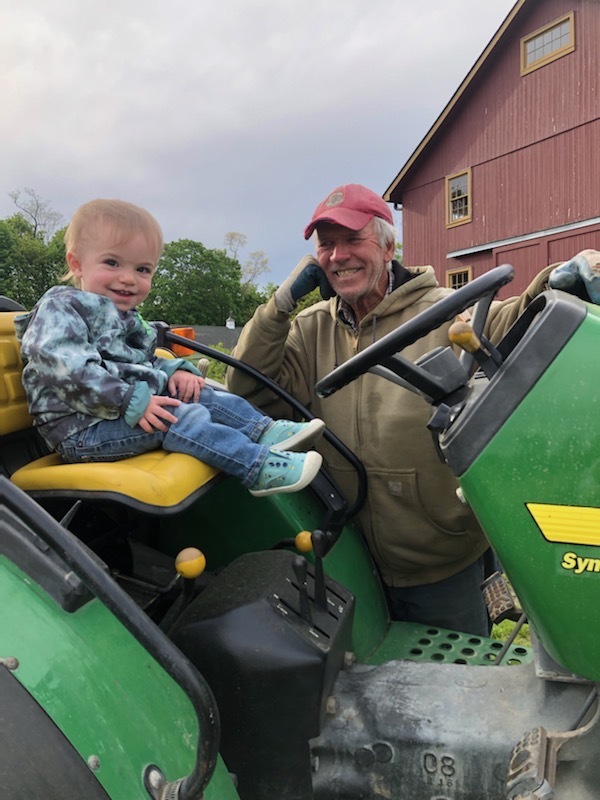 Condzella Kid on Tractor with John Sr